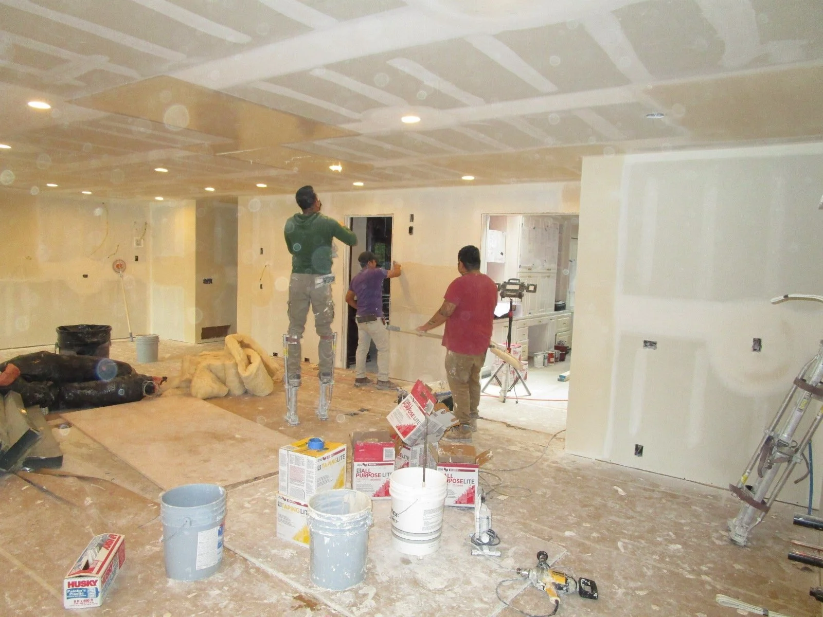 Sheetrockers rockin' the sheetrock.