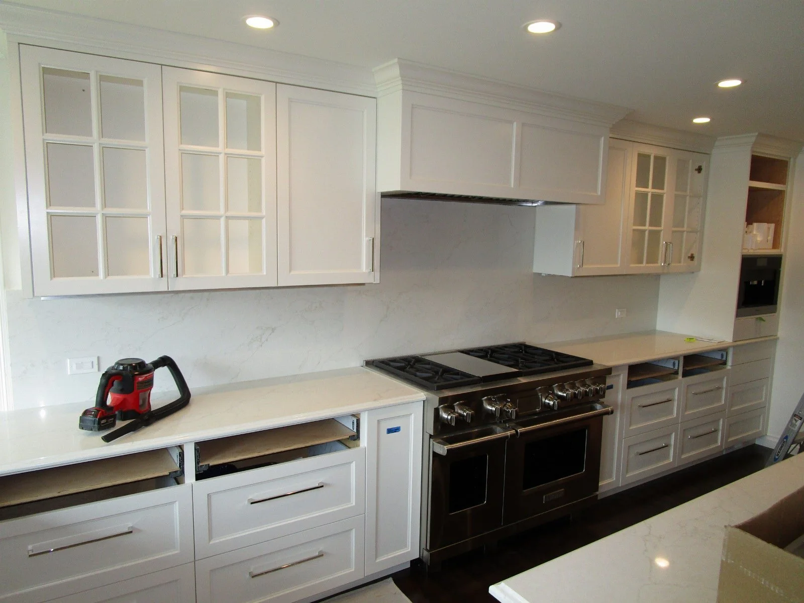 Remember there was a big masonry fireplace that was demo'd where the range is now.