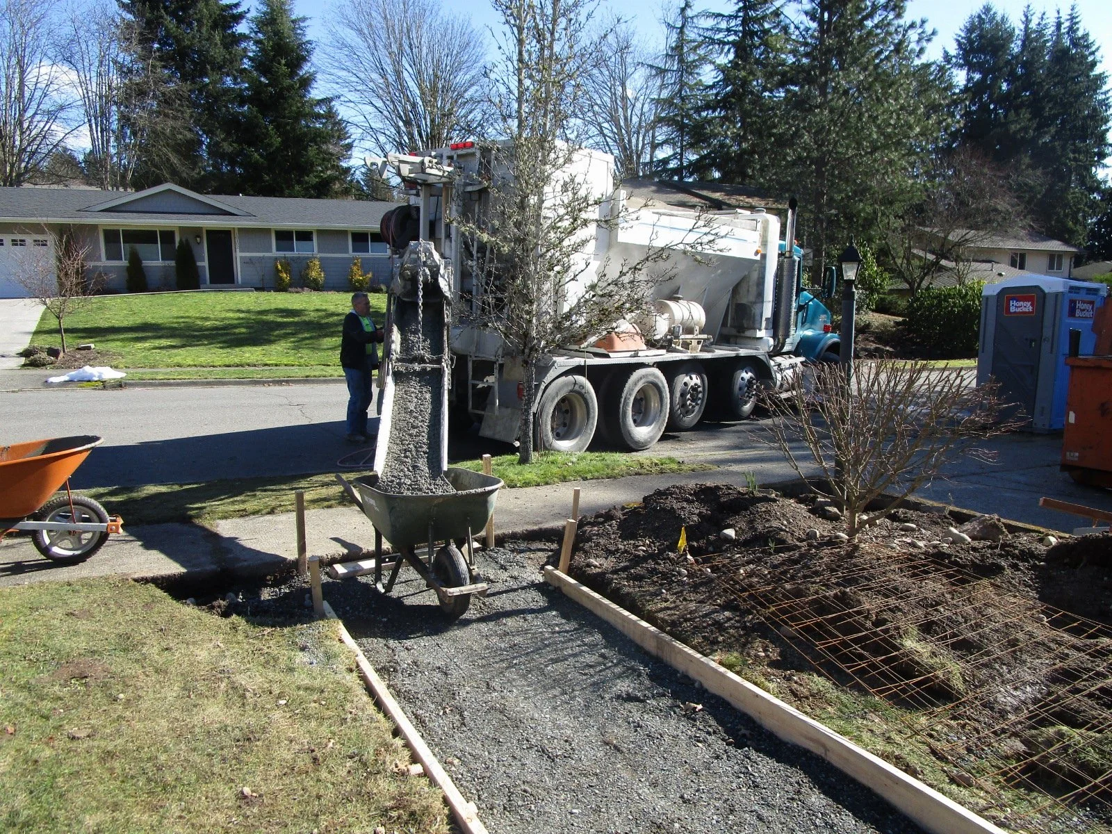 Little mini concrete truck that mixes the batch right at the site. Great for if you need just a oouple of yards.