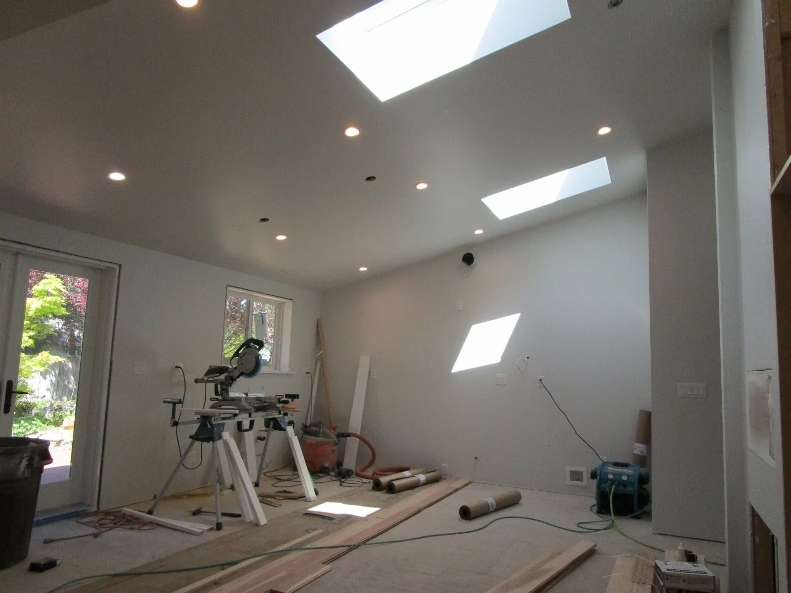 View of the kitchen area with the 4-foot bump out now, and a vaulted ceiling, new skylights will add lots of extra light.
