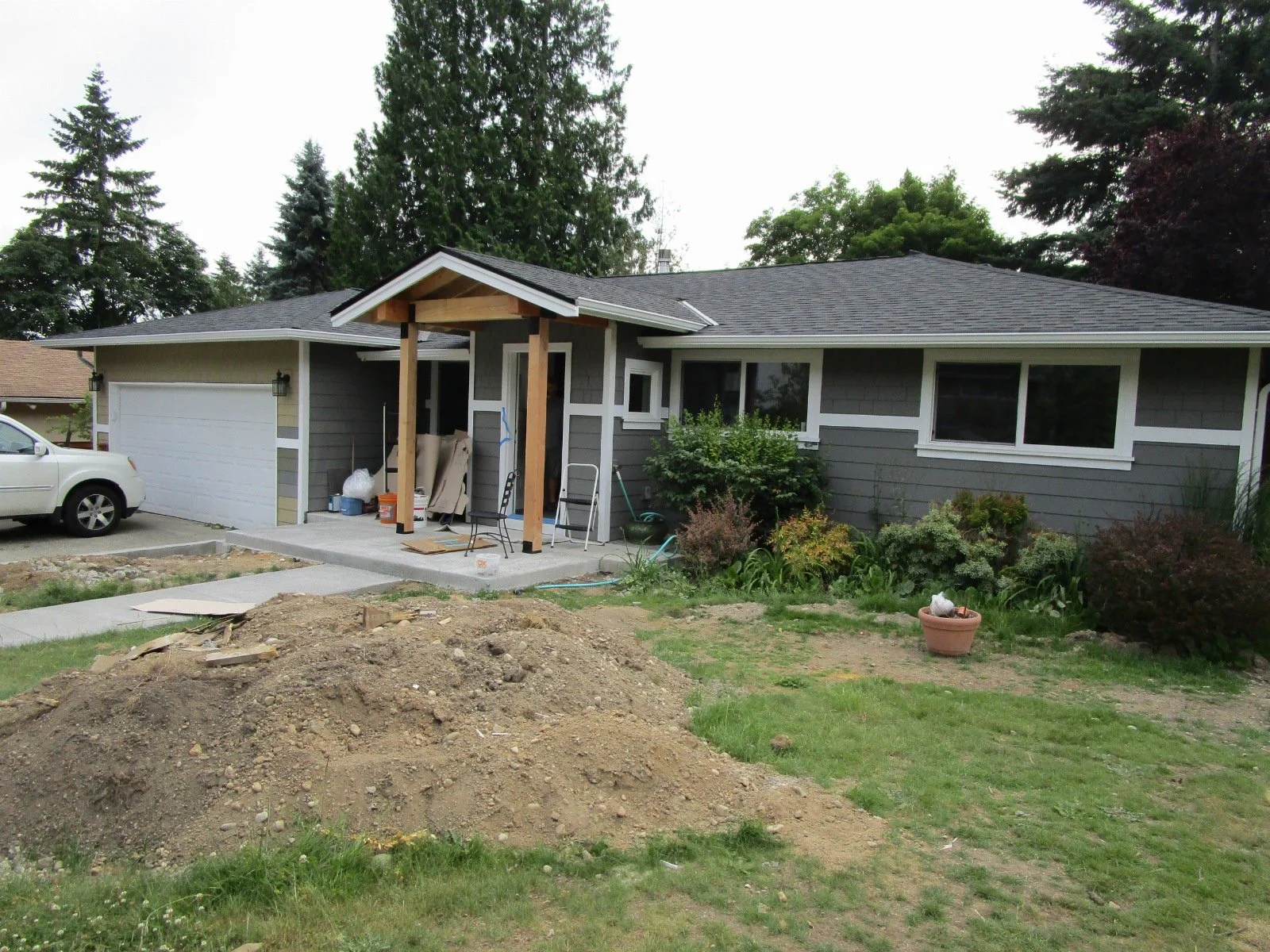 Outside the new little entry takes shape.