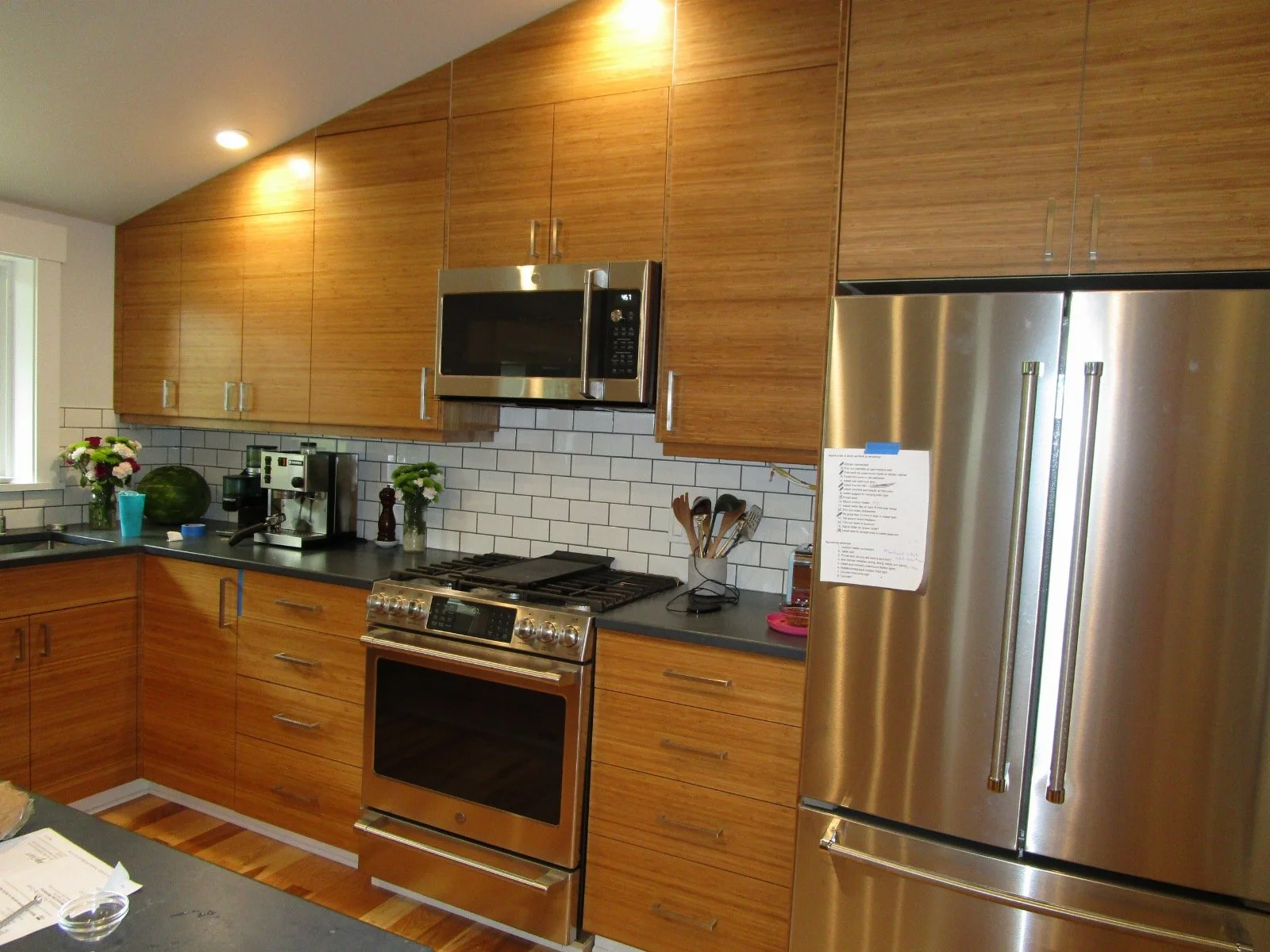 Kitchen mostly done. Punch list on the refer. As seems to be the case on these major remodels, the homeowners start moving back in when the project is about 98% done.