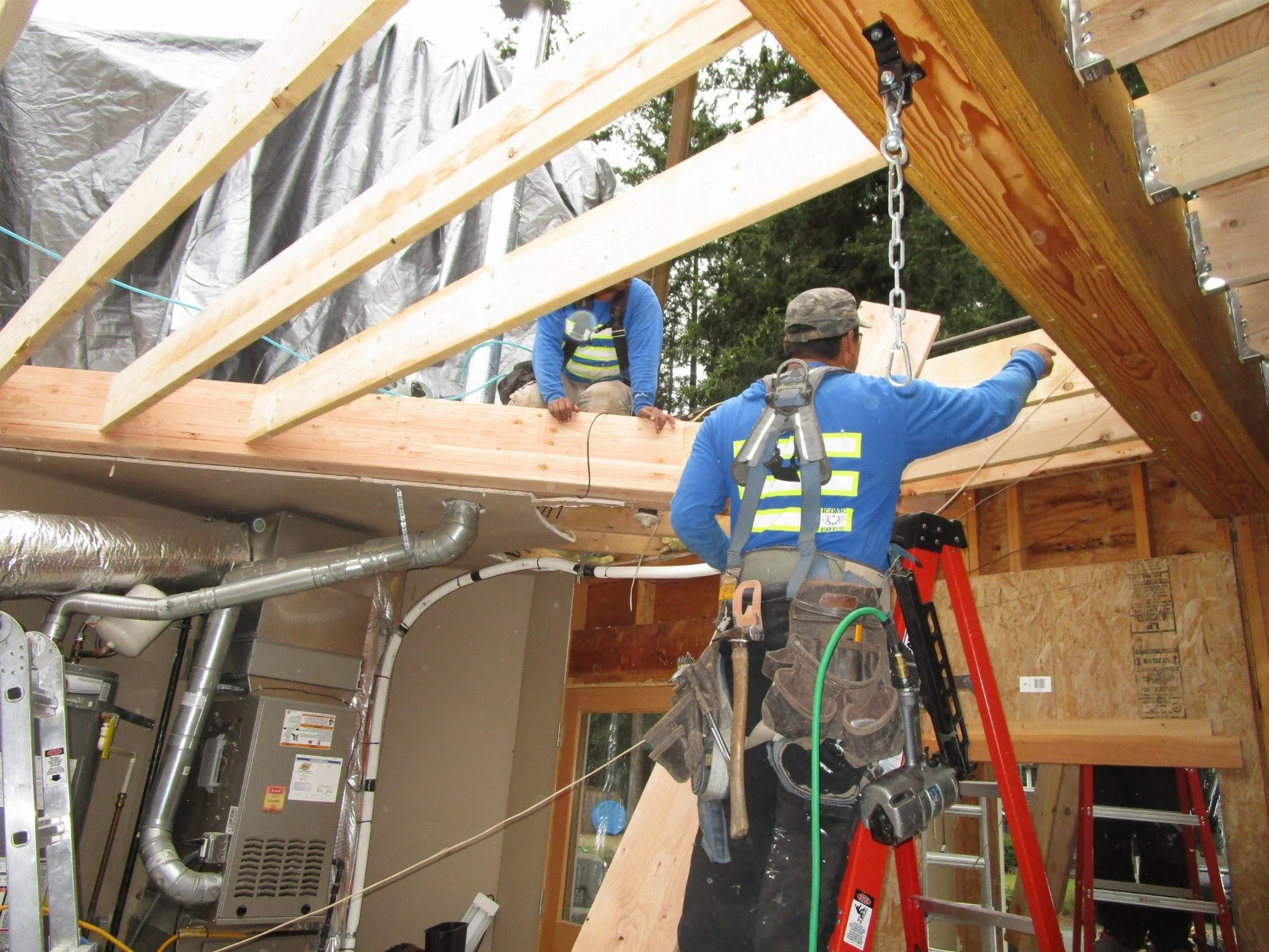 This is the area where the garage meets the main house at a 45 degree angle. So special cuts all through here. The sandwiched LVL beam in the upper right.