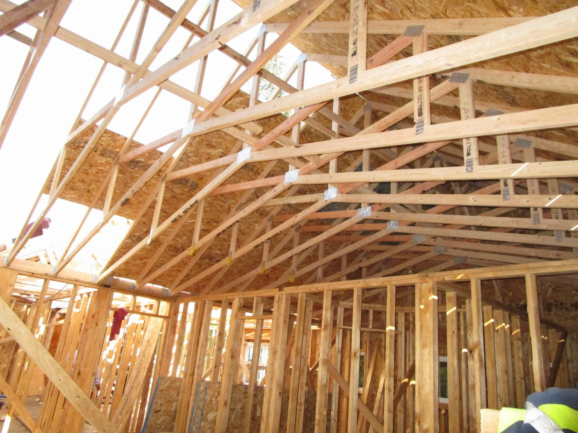 Using some scissor trusses to provide a bit of a vault in this area.