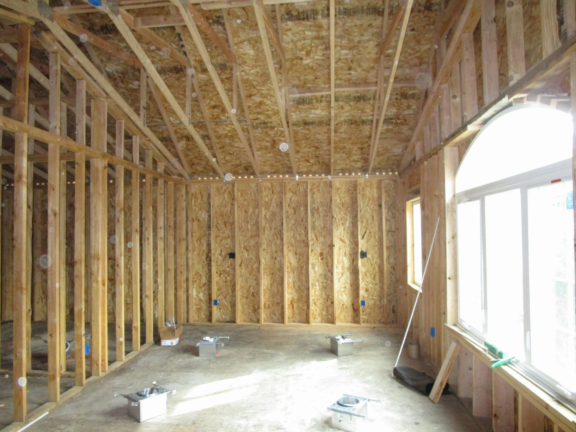 Part of the Master Bedroom, with the vaulted ceiling via use of scissor trusses.