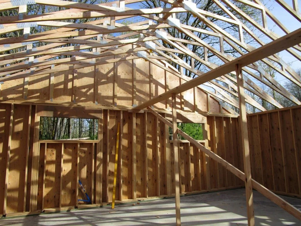 More scissor trusses in the rehearsal room behind the garage.