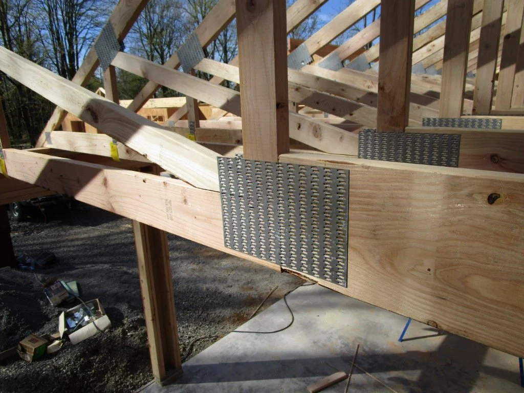 Big beefy joint at the lower corner of the Attic truss. 2x4 bottom cord and the truss changes to 2x8 bottom cord at the "Attic" area span.