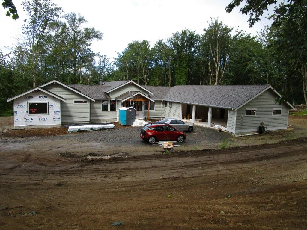 Siding and roofing on.