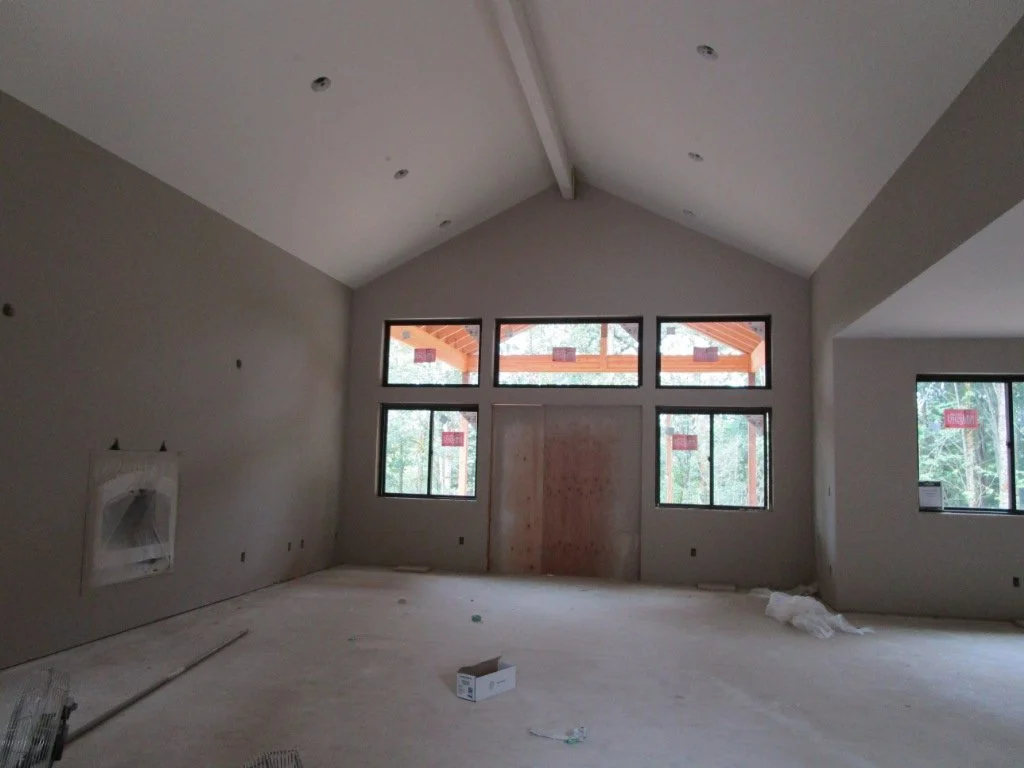 Main Living Room with future fireplace on the left.