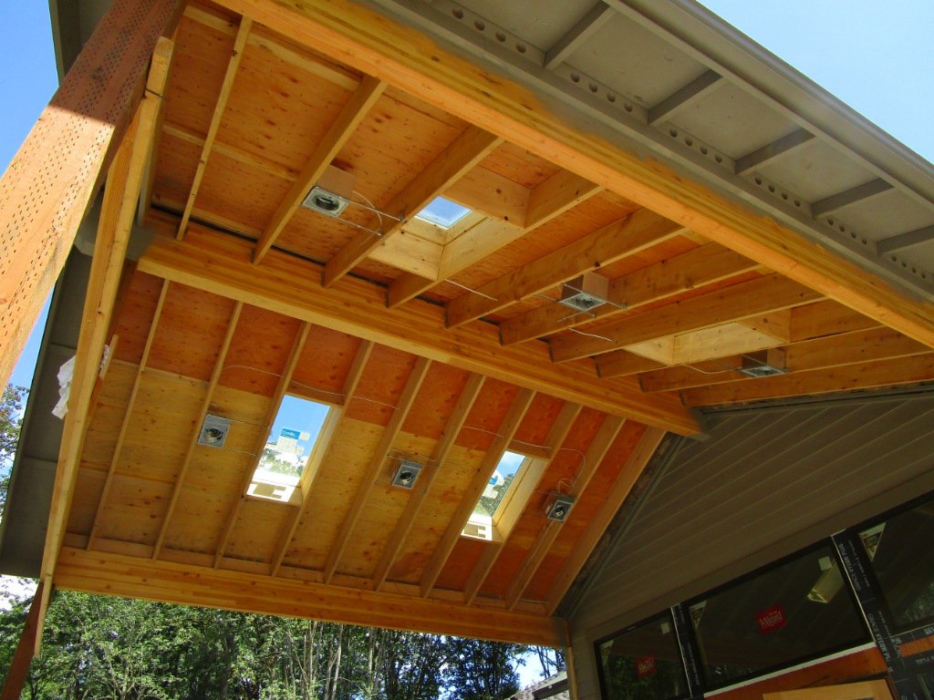 Outdoor attached cabana getting lights installed.