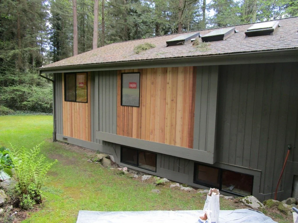 On the outside, new siding where windows were installed.