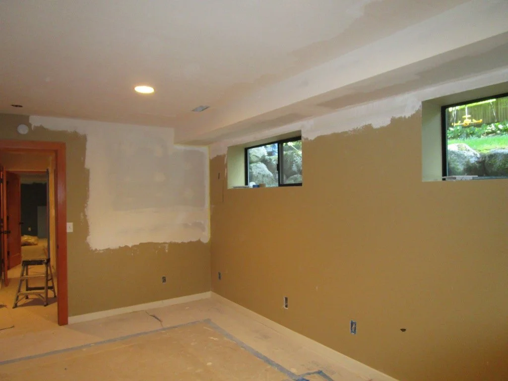 Starting to patch up the basement areas. This was all torn up to run plumbing in the Master Bath above.