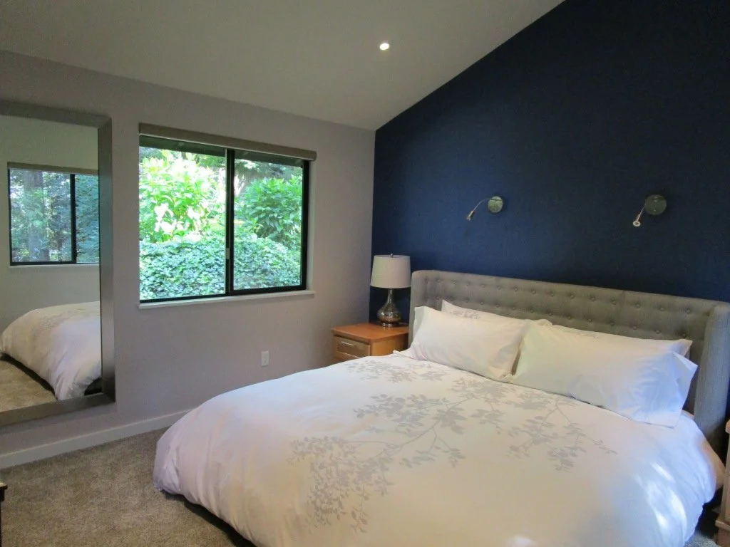 Master bedroom with new window. Favorite color of the owners is blue.