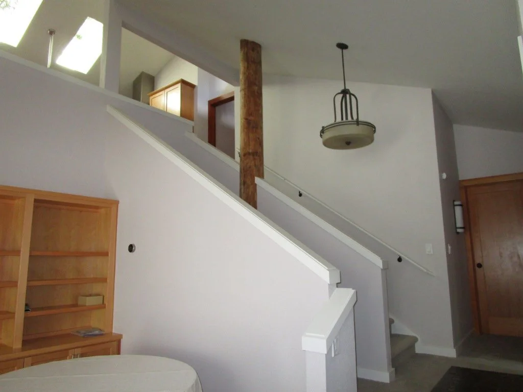 New stair configuration finished. Original log pole has been preserved.