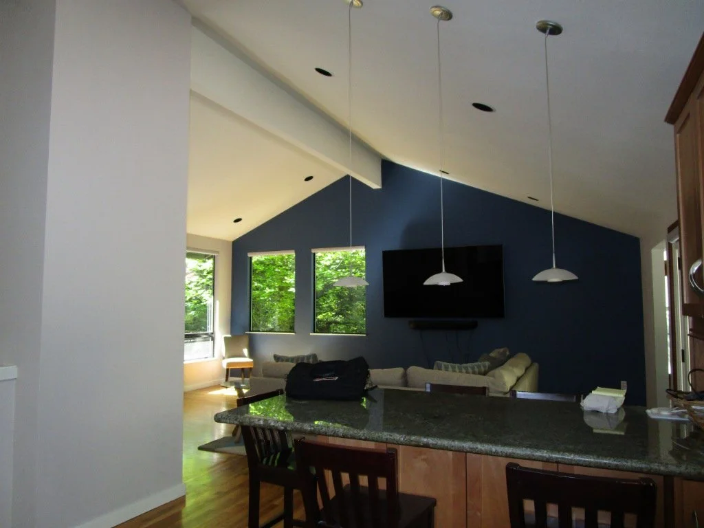 Except for the exposed log pole, most of the existing wood has been covered. Beams, etc.