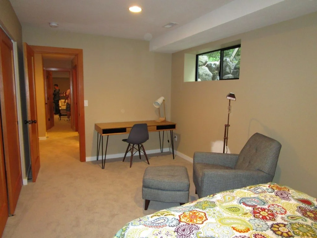 This was the basement room torn up pretty good for all the plumbing work above. Now put back together.