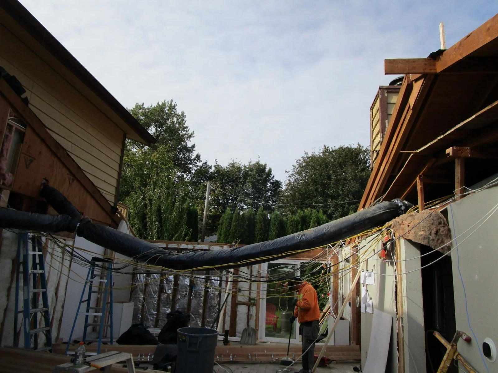 Boom, goodbye old roof.