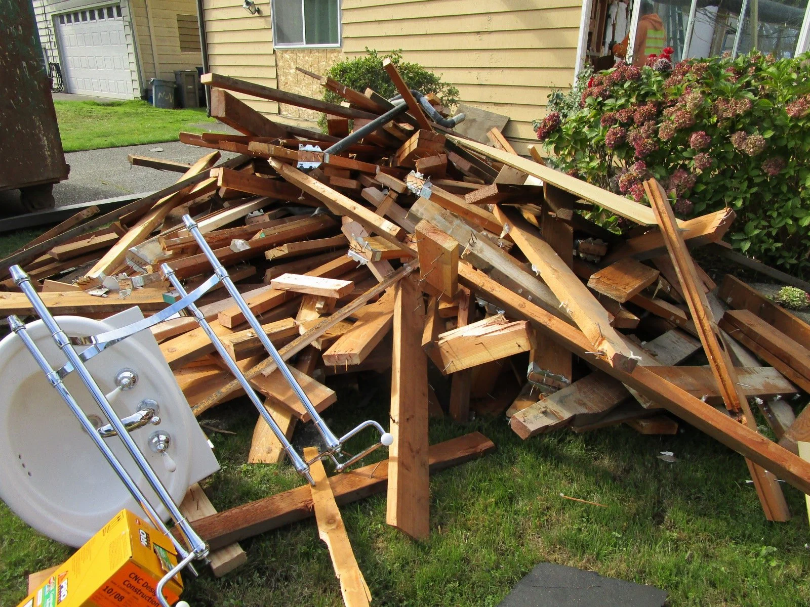 Parts of the old roof carefully cut out little by little.