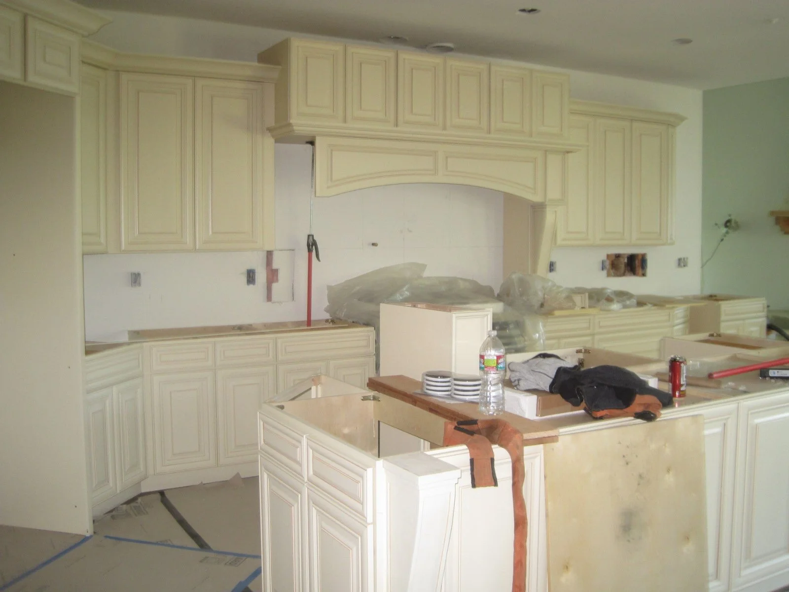 Kitchen cabinets going in. Owner has chosen a traditional look.