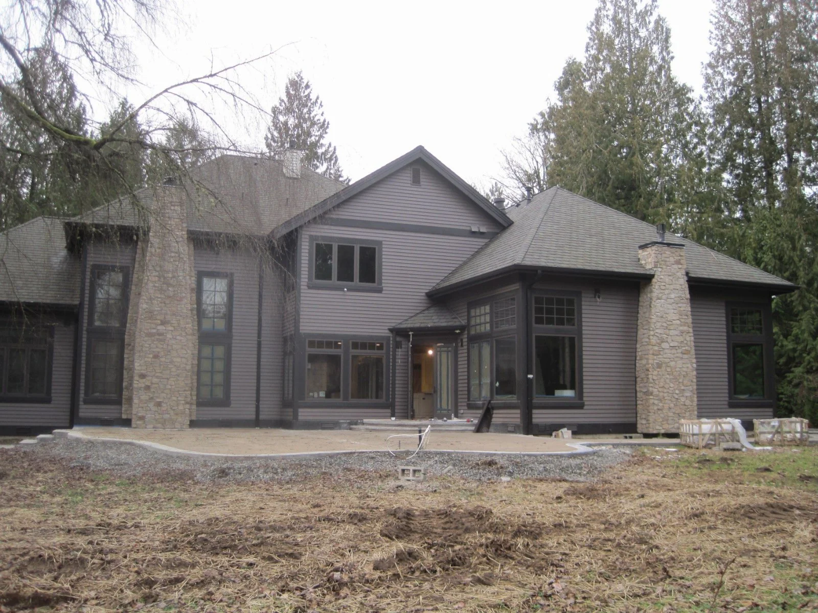 Back side patio. A swimming pool will eventually go in too.