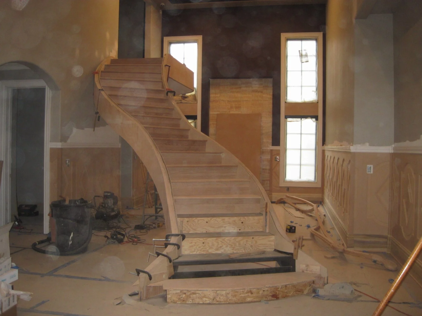 Inside the double curved stair is in place, and getting finished.