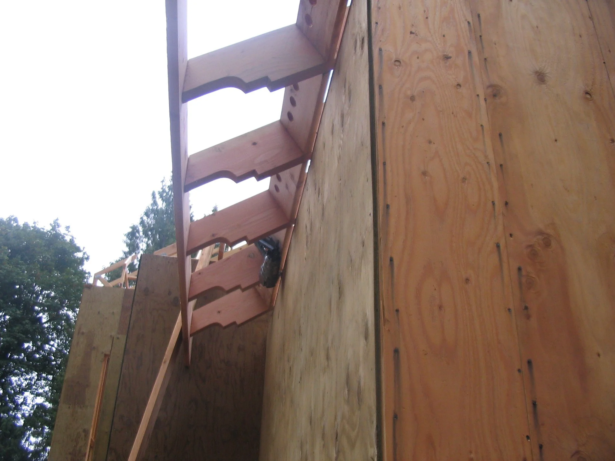 Note the special tails for the roof overhang.