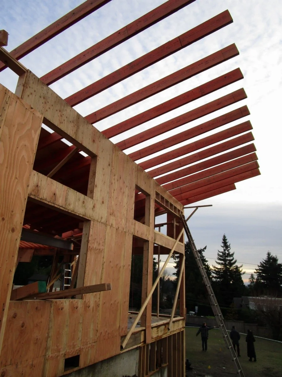These rafters will cover a BBQ area over a yet to be built portion of the new deck.