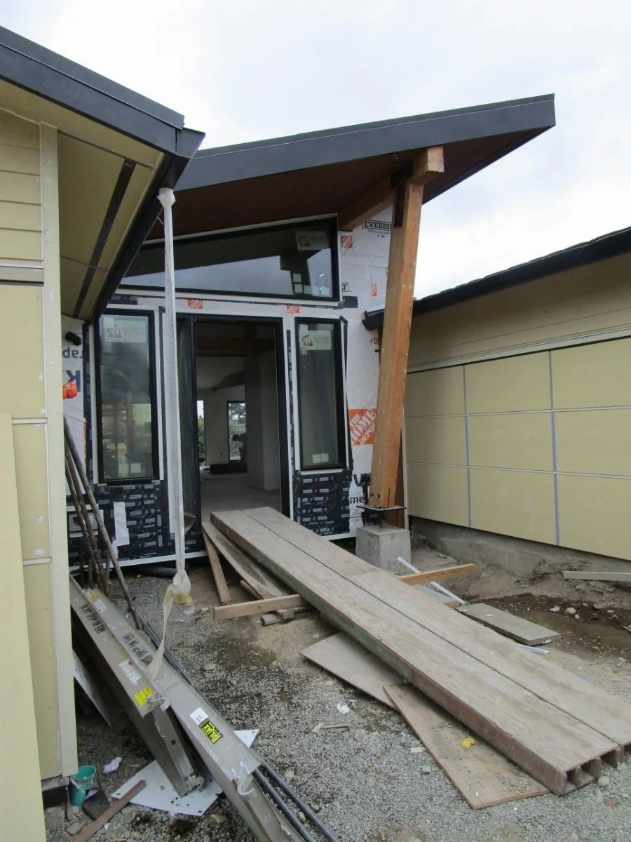 Covered entry to the house.