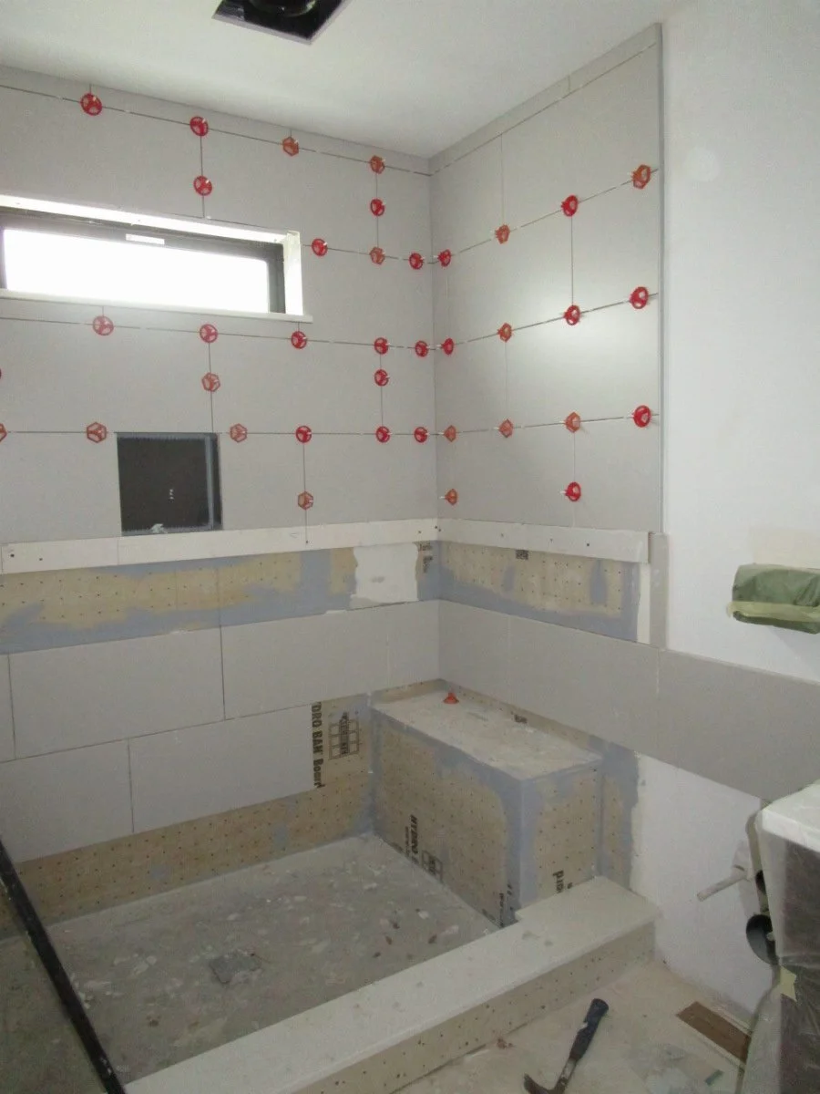 Tile guys have 6 bathrooms to do.