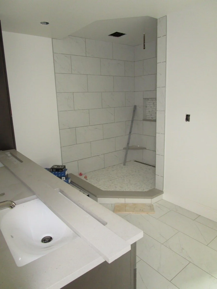 Shower waiting for the glass enclosure.