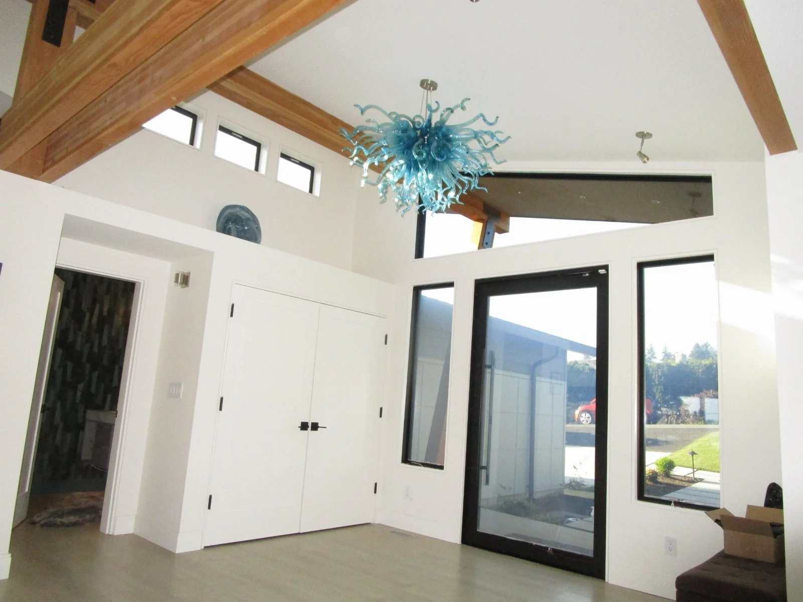 Entryway with the chandalier.