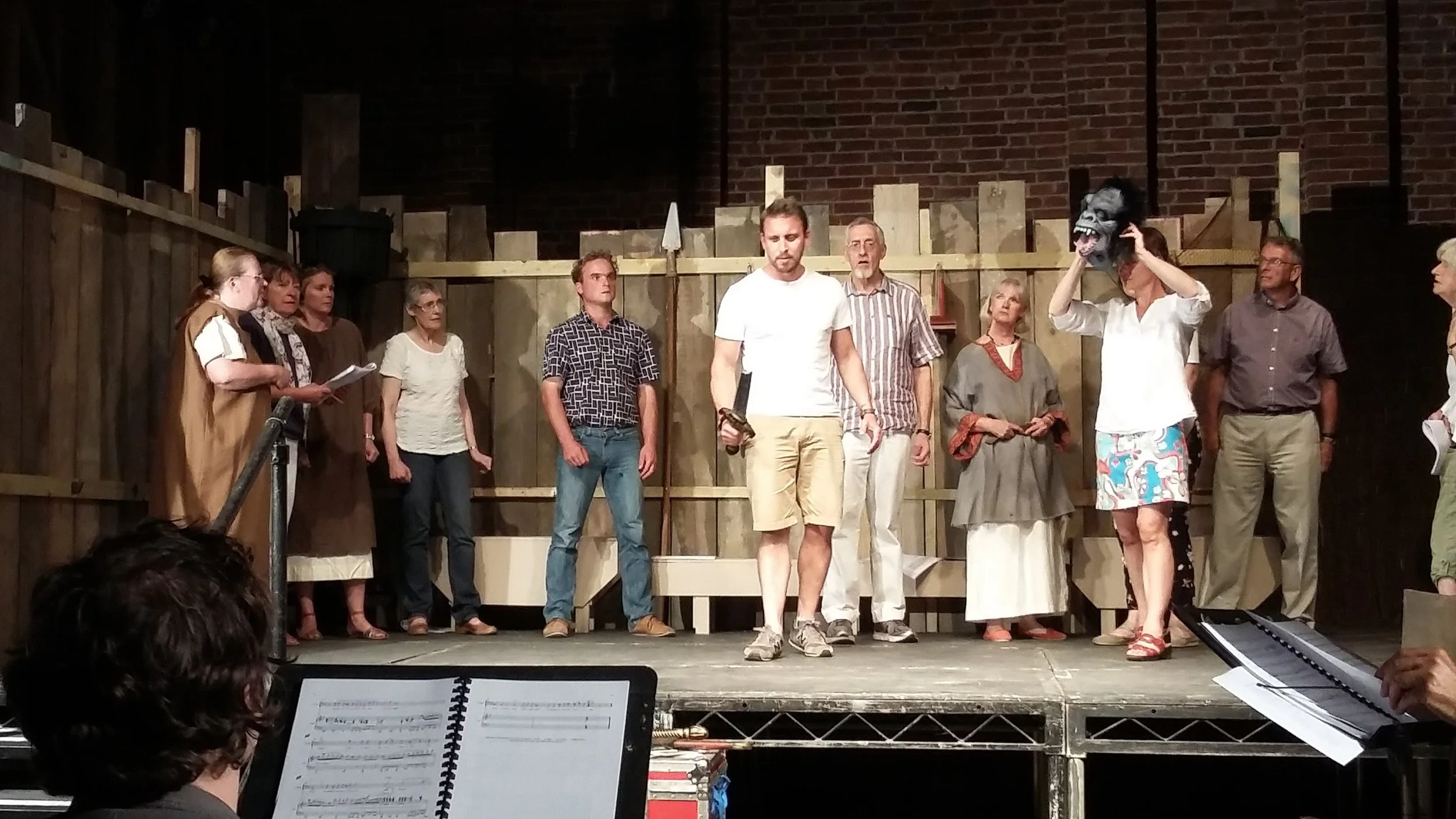 Beowulf with members of the chorus (some in costume)