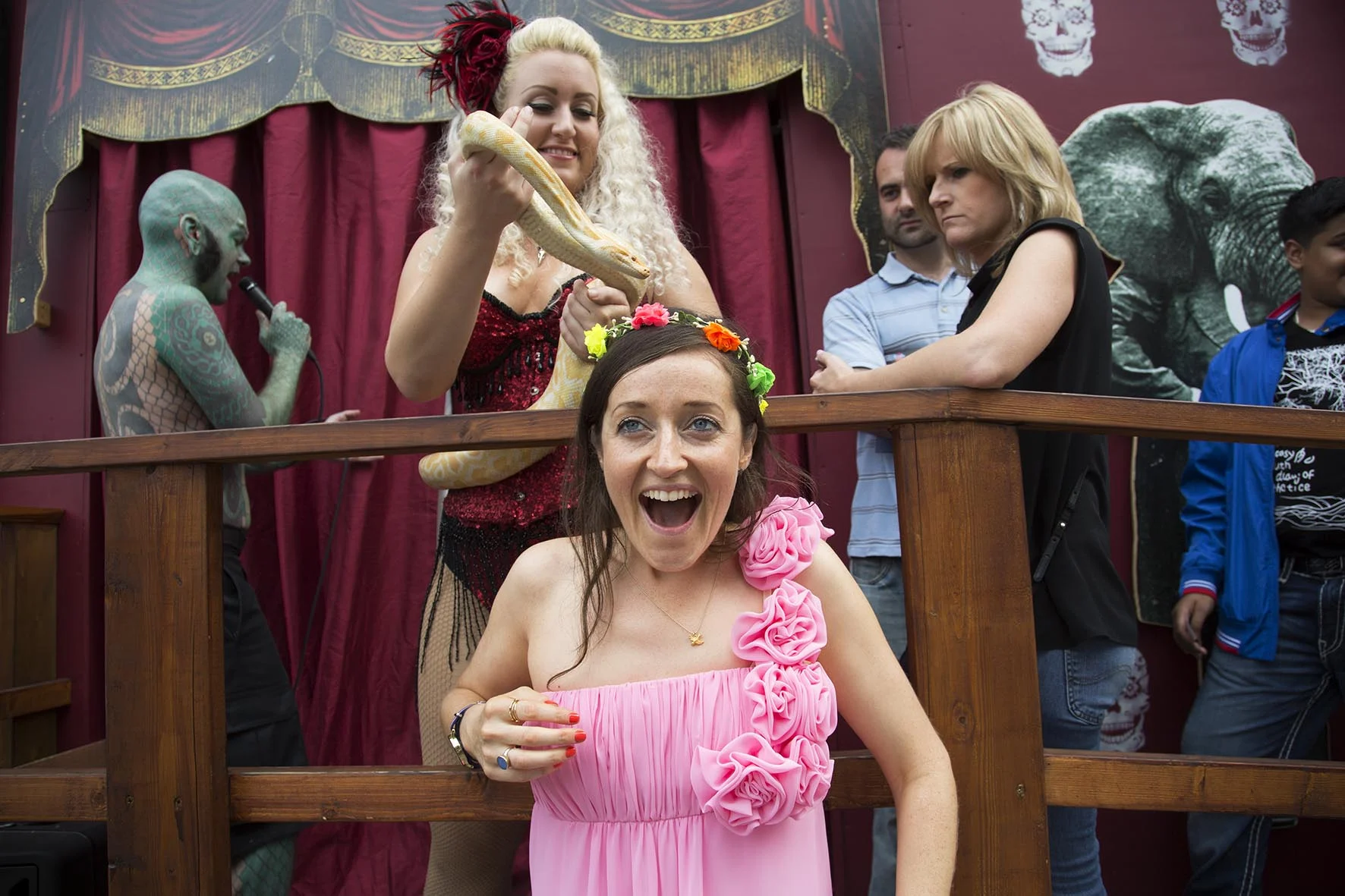 Bride to be Polly on her hen party meets a white python at the Wonderground Side Show.