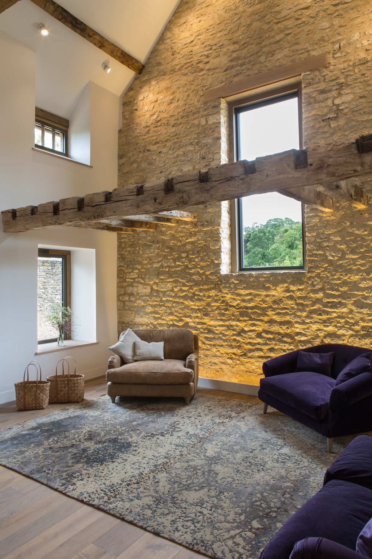 barn-conversion-cotswold-stone-wall-wash-lighting-rogue-designs.jpg