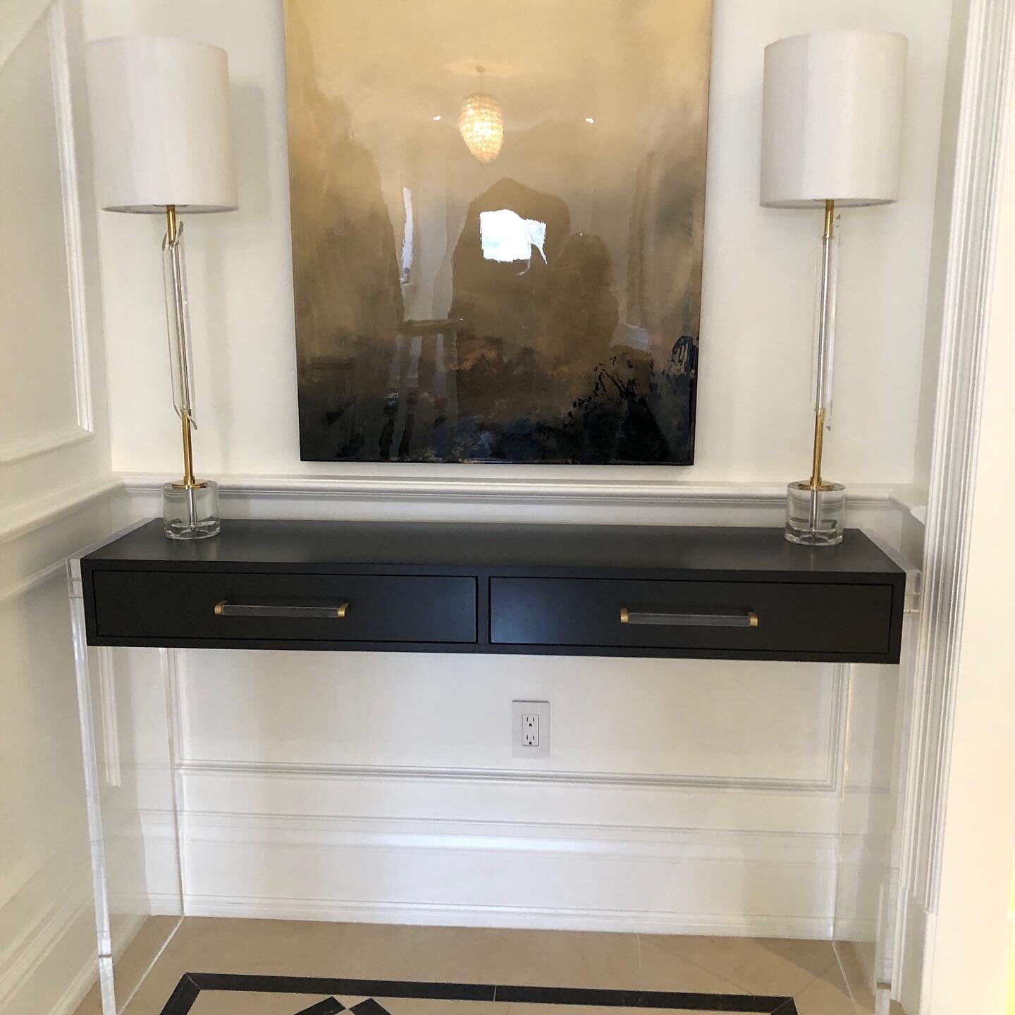 Custom console table we fabricated for a clients front foyer. Espresso stained drawer unit with solid plexi legs. Perfect size, clean uncomplicated designs always work. 

#contemporaryfurniture #onlycustom #customfurniture  #interiordesign #torontofu