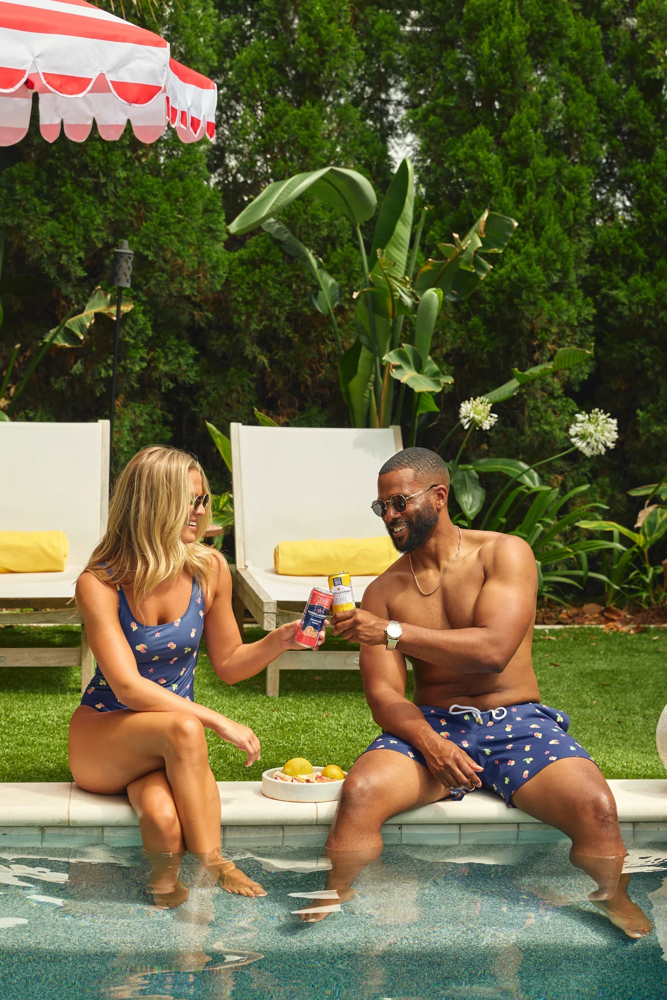 Kenny-Flowers-Sanpellegrino-mens-navy-blue-citrus-swim-trunks-womens-navy-blue-citrus-one-piece-swim-suits-16_97b3332b-acc7-481a-ab06-b84f6bedb240_1340x2009_crop_center.webp