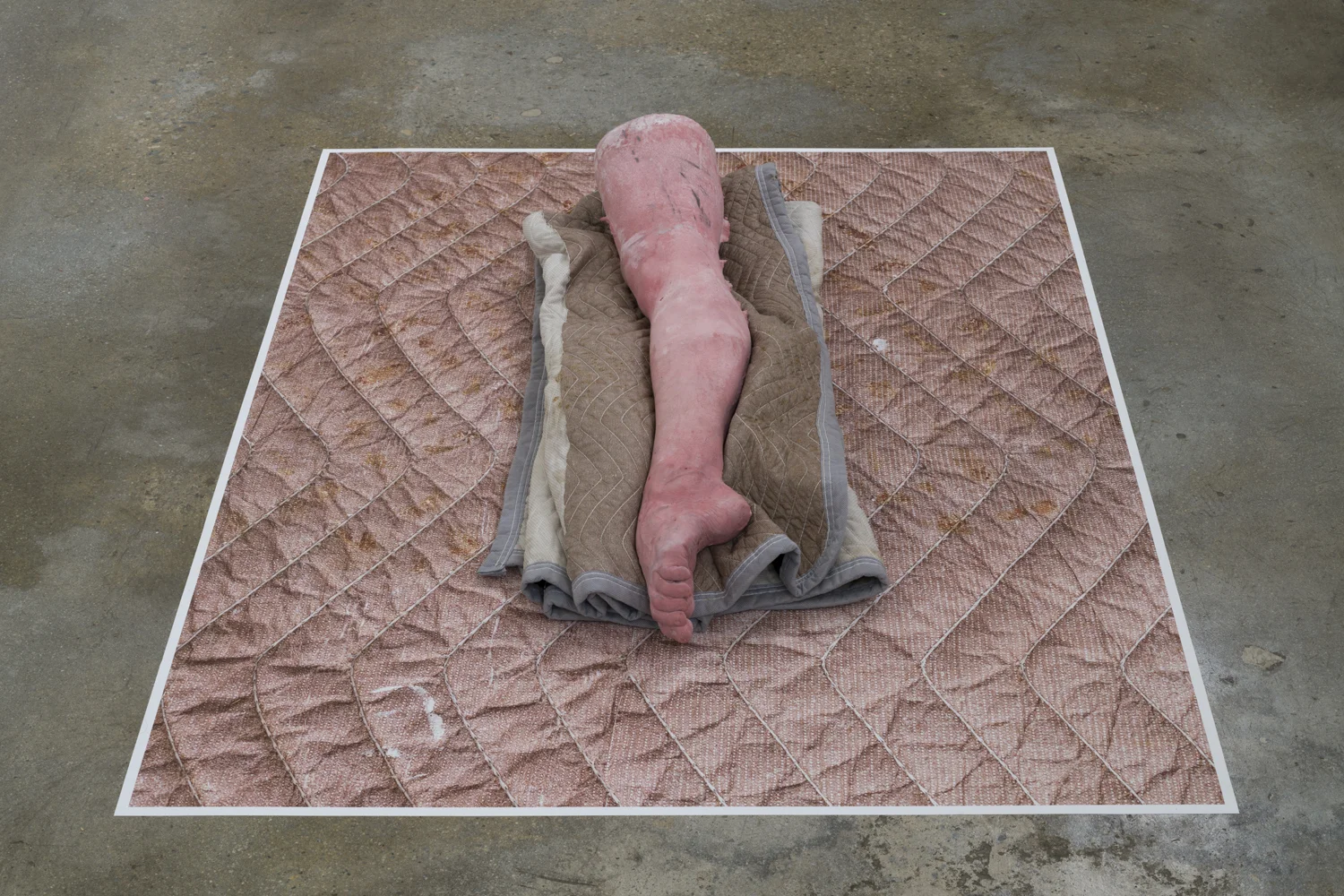 Untitled (Leg on blanket on blanket - pink), 2018 Pigmented cast hydrocal, packing blanket, pigment print 44 x 58 x 10 inches
