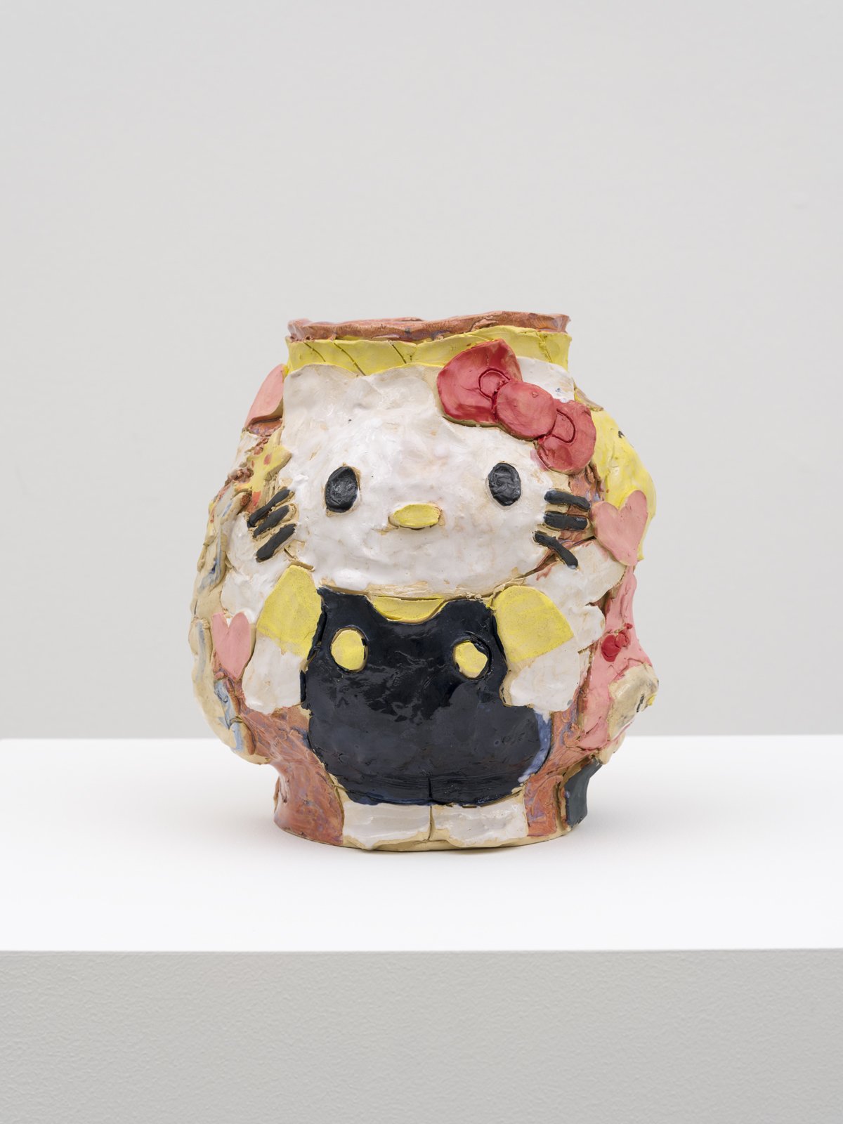  Emily Yong Beck  Sailor Moon and Hello Kitty, 2023  Stoneware, majolica, glaze, gold luster  10 x 8¾ x 8½ in. 