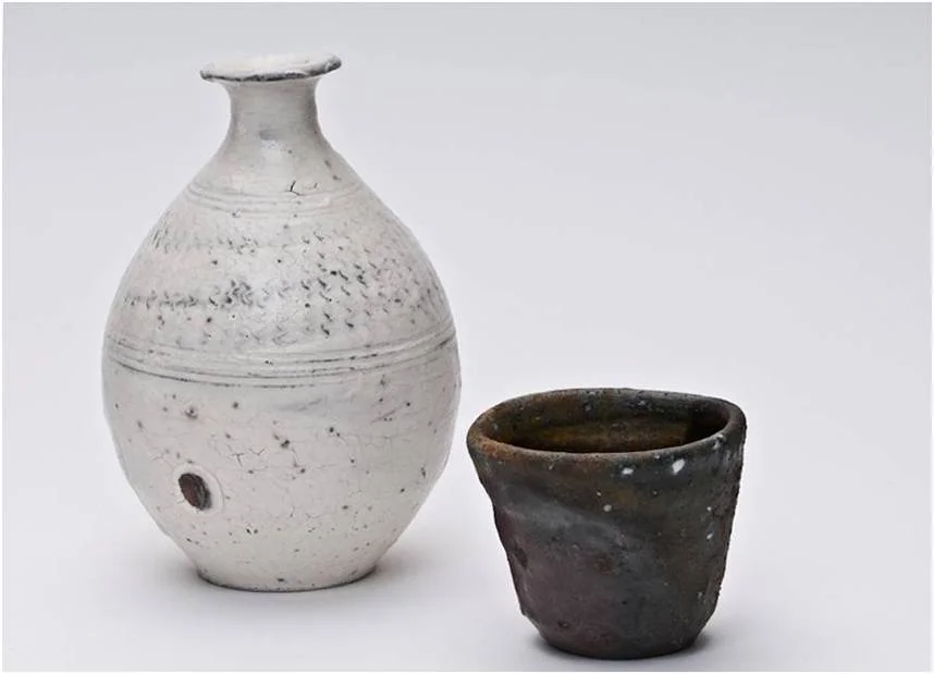  Bottle, Stoneware with White Slip and Clear Glaze, 2009  Cup, Wood Fired Stoneware, 2001 