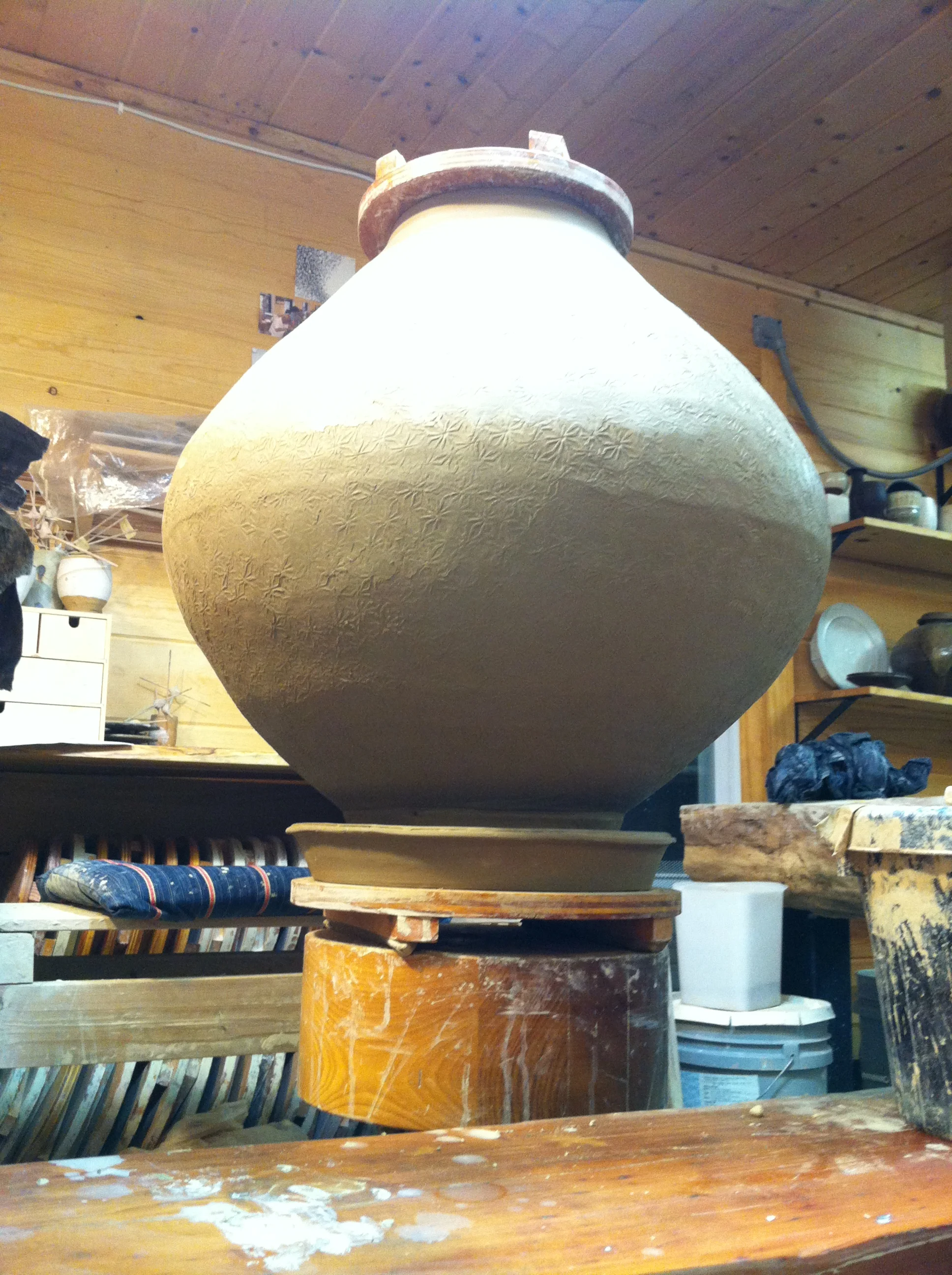 I have started making coil jars for my next wood firing. You're right. This one is upside down. My approach to building large jars is somewhat unconventional, but works well for me. I first learned of the coil and paddle approach during my apprenticeship with Richard Bresnahan . Richard studied under Takashi Nakazato who, intern, worked within the Karatsu-style way of making pottery. The coiling and paddling technique that I use is directly related to this tradition. 