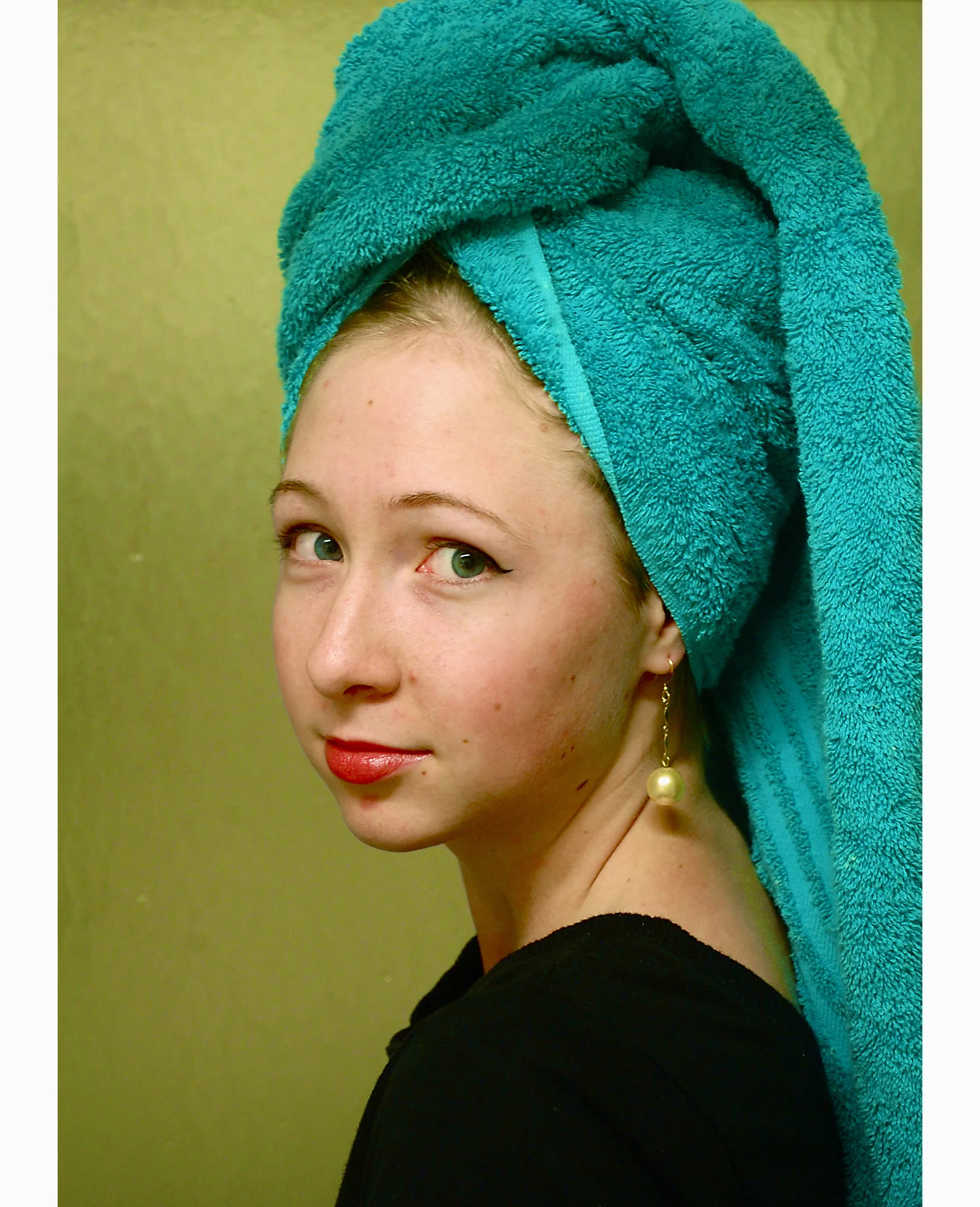 Rachel Munford, Girl with a Plastic Earring , Inkjet Print, 8" x 12", 2011 Project: Students were given the option to focus on portrait photographs that either revealed something about the subject or made a reference to another historical image. This image is a recreation of Johannes Vermeer's painting, Girl with a Pearl Earring. This work was created in Photographic Digital Imaging at Wells College.