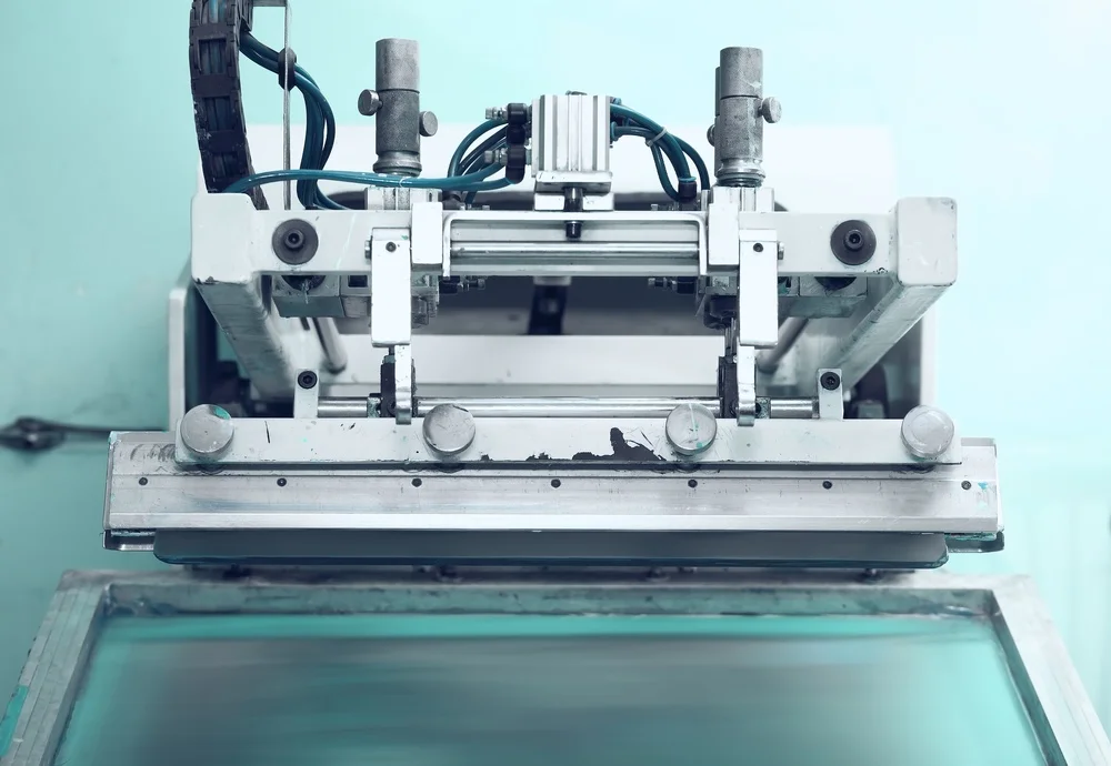 bigstock-Retro-Printing-Press-In-The-Si-90865007.jpg