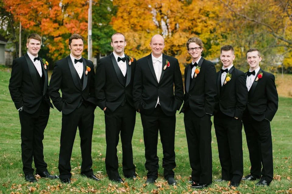 Black Tuxedos with matching black bow ties