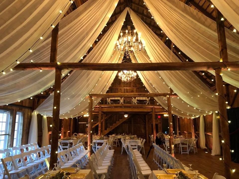Ceiling Draping and Lighting provided by Geyer Wedding and Event Rentals