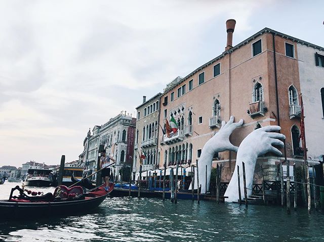 Taking in #lorenzoquinnsupport . This monumental piece is a visual statement of the impact of climate change and rising sea levels on the historic canal. 🌊 🇮🇹🌊
.
.
.
.
.
.
.
#adventure #travel #darling  #bkbloggers #gooutside #travelgram #instago