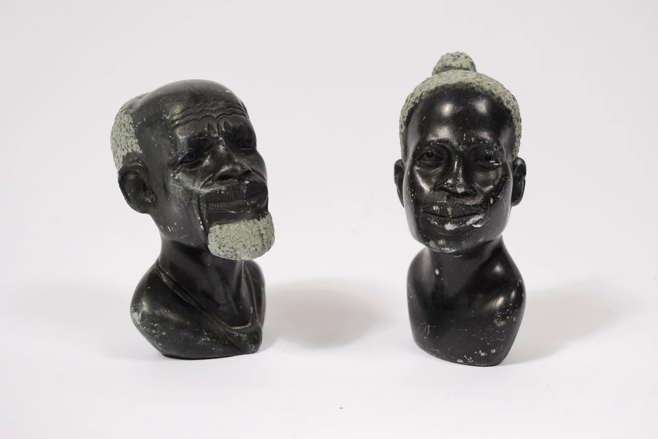 Stone curved head man and woman, marble, 50's