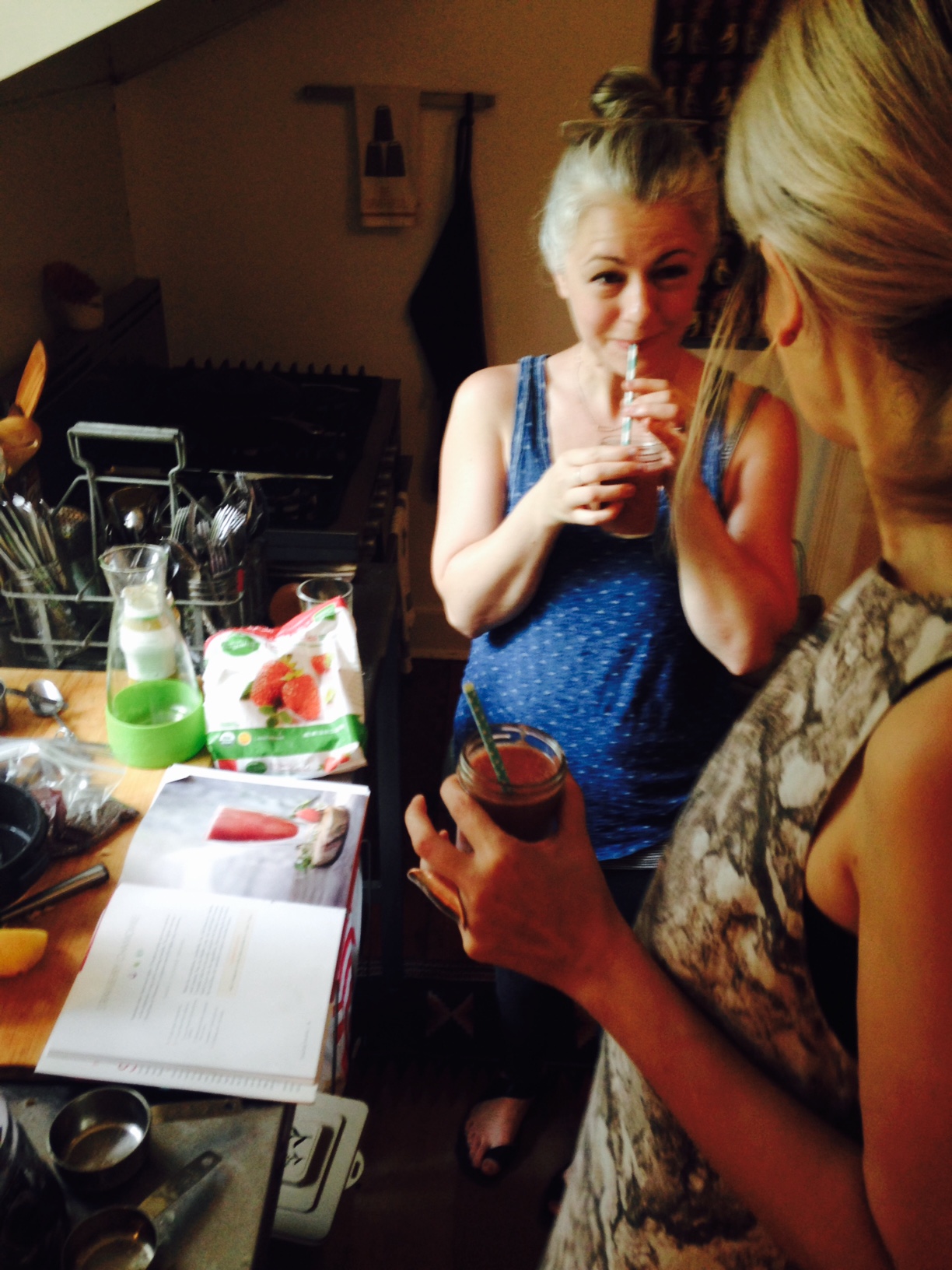 When we courageously share our personal journey, we inspire transformation in others . Sanni Baumgartner (front), owner of Community, a boutique for local and sustainable fashion, shares her favorite super-smoothie recipes with guest (Strawberry Chamomile and Mulberry Tahini.) Our Socials create space for storytelling around personal health and the rituals that help us be well.