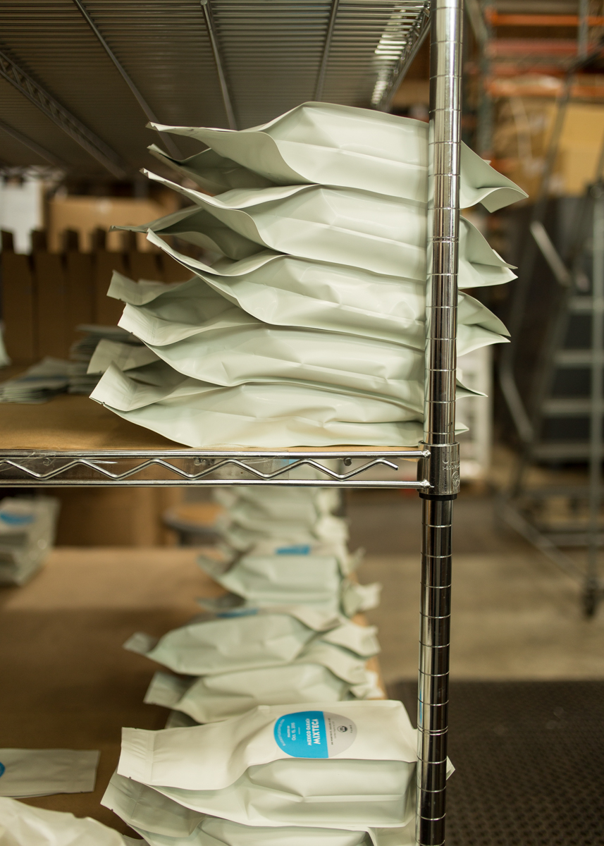 freshly bagged coffee ready to be shipped out to the members of the subscription service