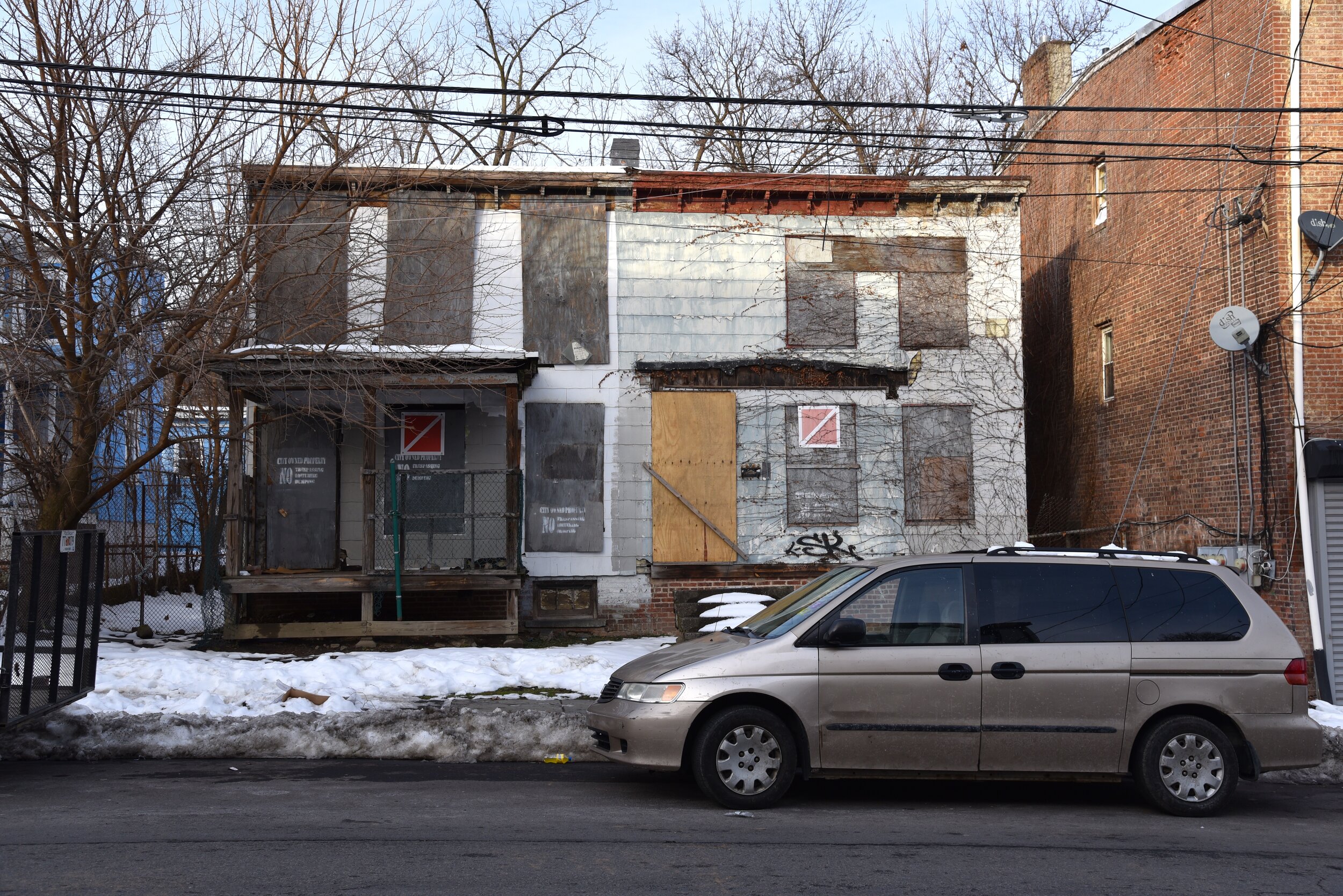 2020 Grey Minivan With Abandoned Homes - Newburgh NY T.JPG
