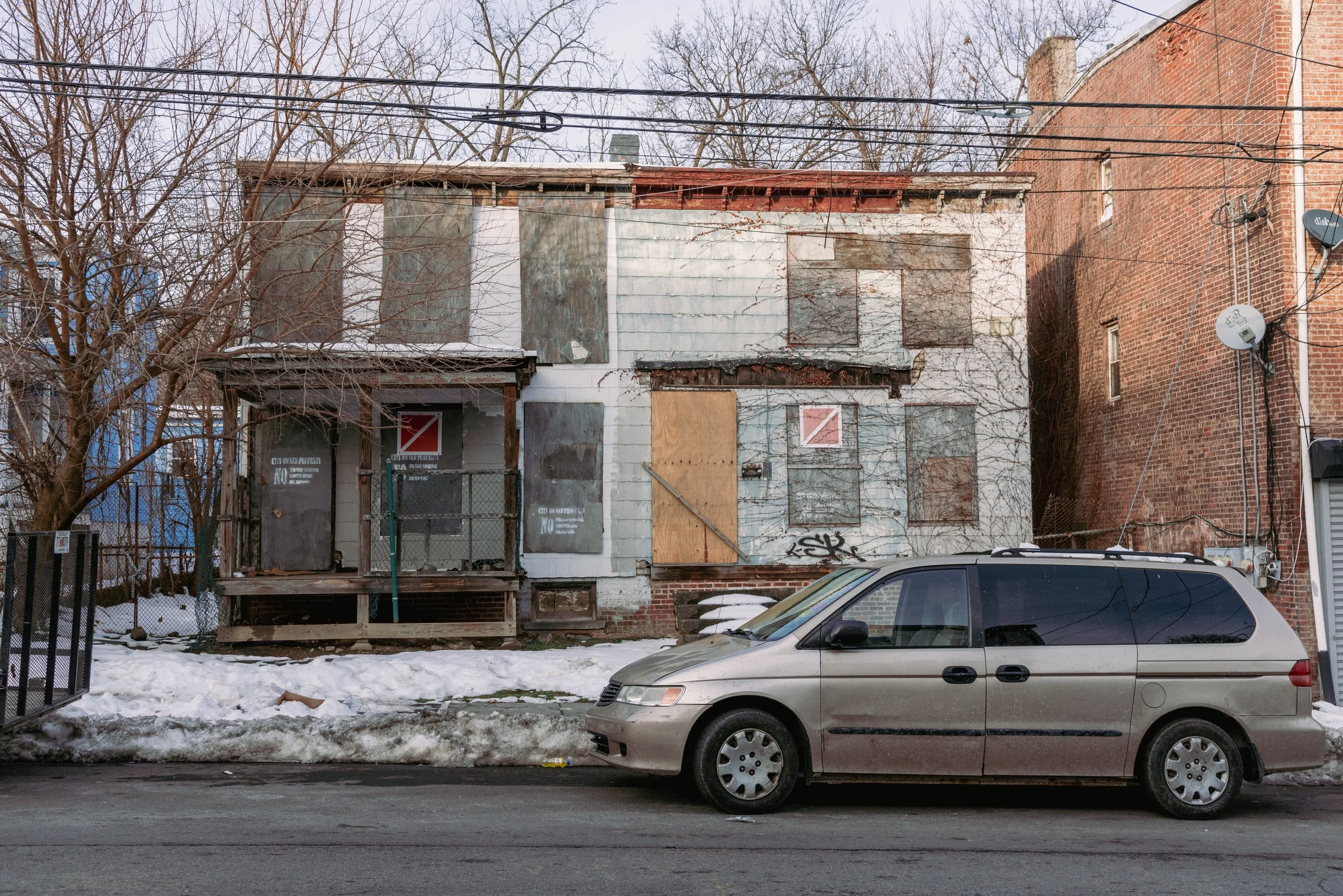 2020 Grey Minivan With Abandoned Homes - Newburgh NY L.jpg